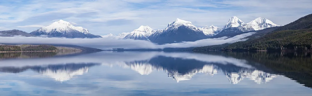Low fog over Lake McDonald and the surrounding mountains in Glacier National Park