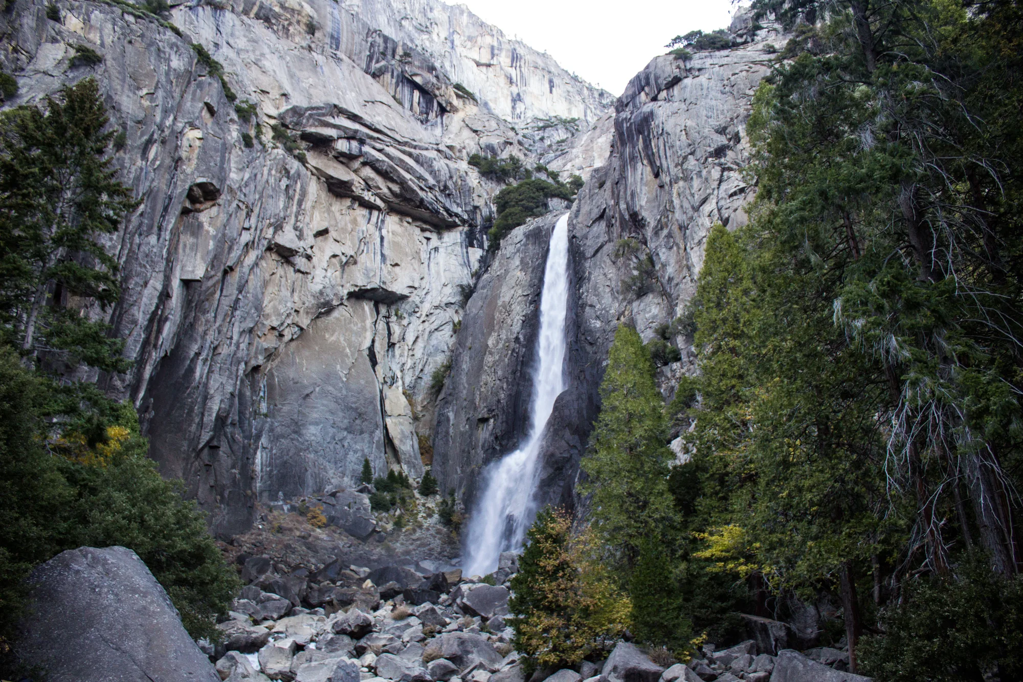 Hikers on the granite steps of the Mist Trail beside Vernal Fall, Yosemite